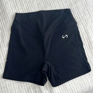Black TLF shorts, size medium.